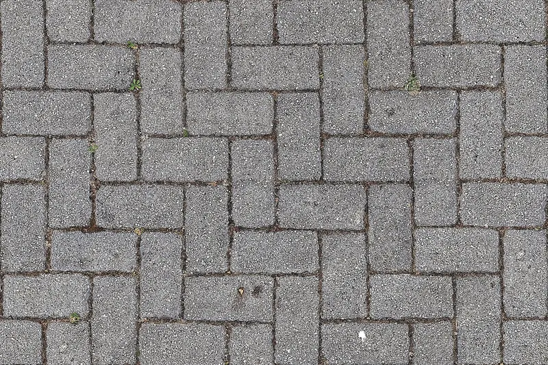 Pflasterarbeiten an einem Gehweg